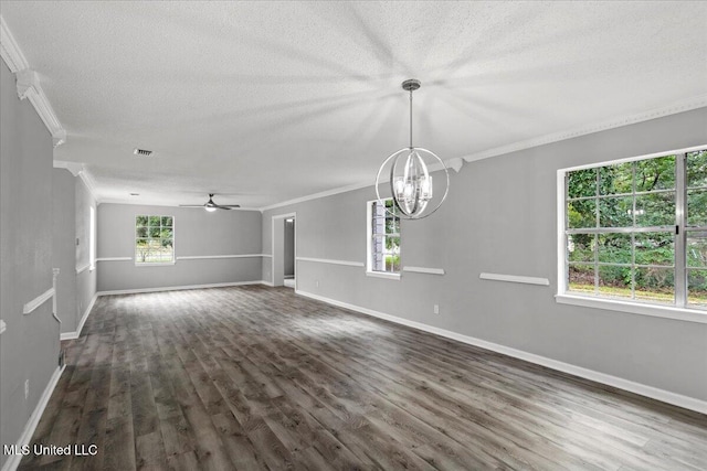 interior space featuring a textured ceiling, ceiling fan with notable chandelier, crown molding, and dark wood-type flooring