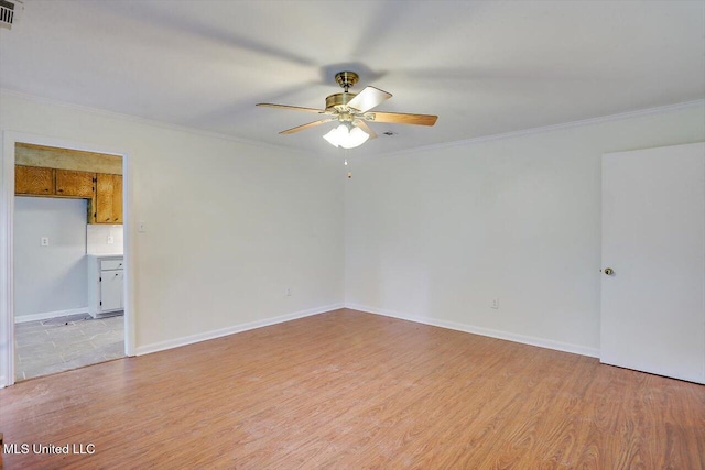 unfurnished room with light hardwood / wood-style floors, crown molding, and ceiling fan