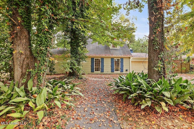 exterior space with a garage