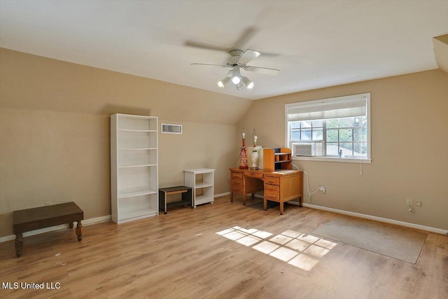 office space featuring vaulted ceiling, light wood-type flooring, and ceiling fan