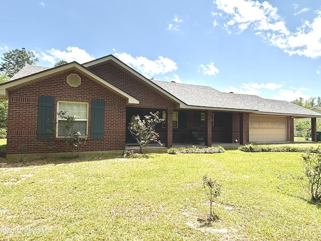 ranch-style house with an attached garage, brick siding, and a front yard