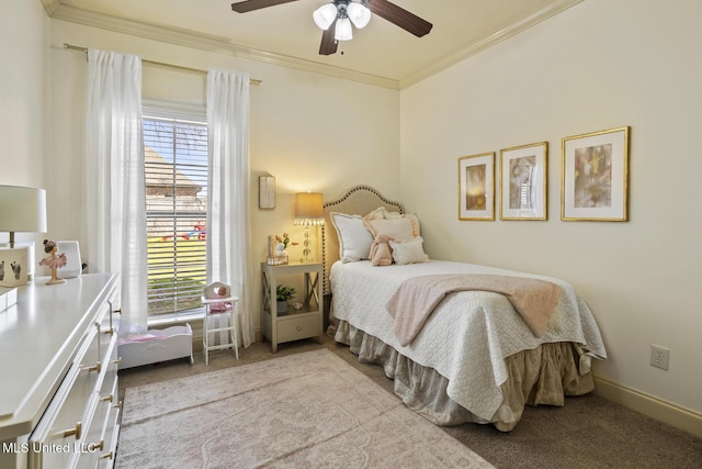 bedroom with carpet floors, multiple windows, baseboards, and ornamental molding