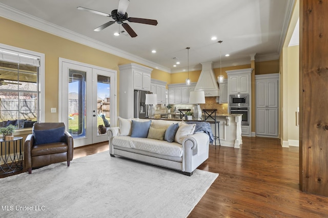 living room featuring recessed lighting, dark wood-style flooring, ceiling fan, french doors, and crown molding