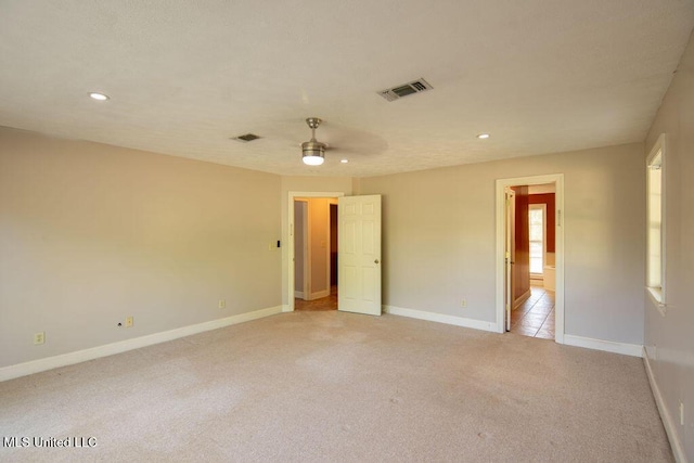 290 Abigail Ln, Bentonia, MS 39040 - spare room with light colored carpet, baseboards, visible vents, and recessed lighting