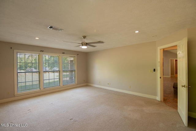 290 Abigail Ln, Bentonia, MS 39040 - spare room featuring light carpet, visible vents, recessed lighting, baseboards, and a ceiling fan