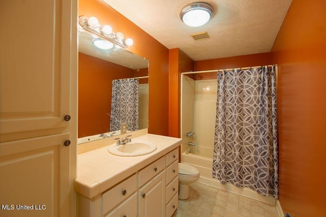 290 Abigail Ln, Bentonia, MS 39040 - bathroom with a textured ceiling, vanity, shower / bath combination with curtain, toilet, and visible vents