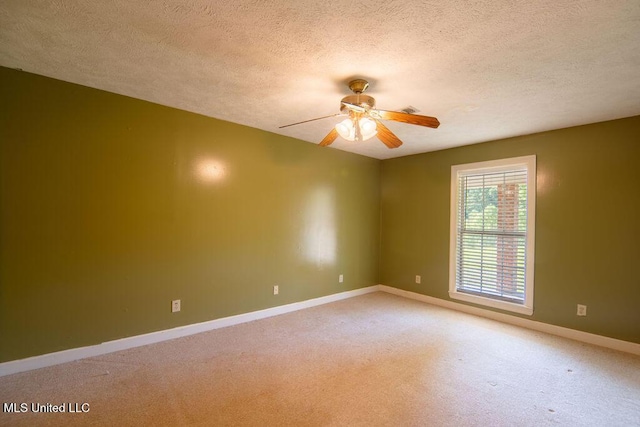 290 Abigail Ln, Bentonia, MS 39040 - unfurnished room featuring a textured ceiling, light carpet, baseboards, and ceiling fan