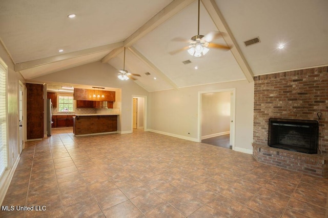 290 Abigail Ln, Bentonia, MS 39040 - unfurnished living room with a brick fireplace, visible vents, lofted ceiling with beams, and ceiling fan