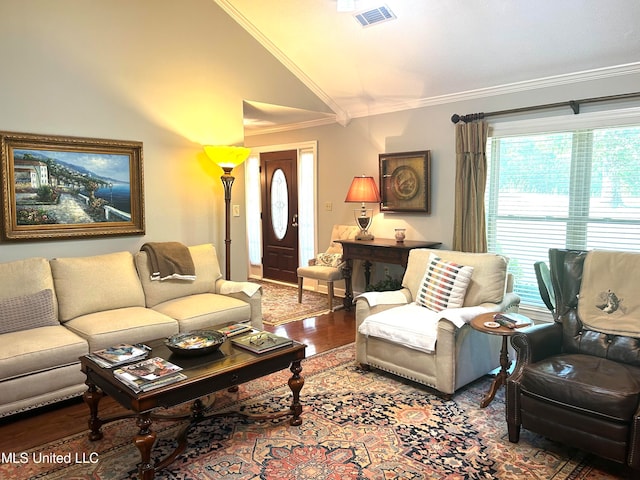 living room with crown molding, vaulted ceiling, and hardwood / wood-style flooring