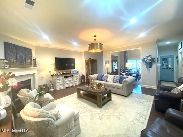 771 Robertson Way, Hernando, MS 38632 - living room featuring wood finished floors and a fireplace