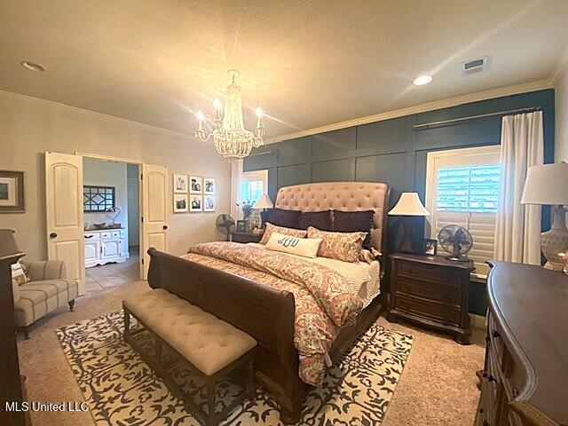 771 Robertson Way, Hernando, MS 38632 - bedroom featuring a chandelier, light colored carpet, ornamental molding, and recessed lighting