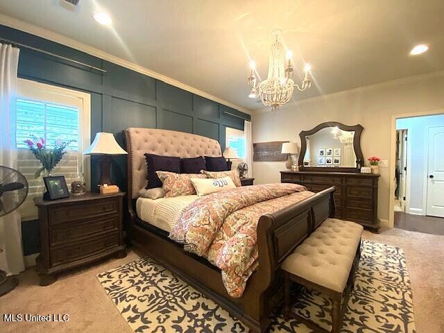 771 Robertson Way, Hernando, MS 38632 - bedroom featuring light colored carpet, a chandelier, crown molding, and recessed lighting