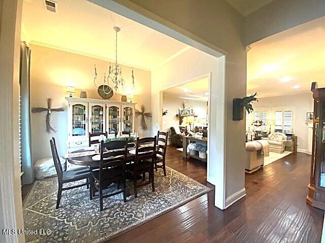 771 Robertson Way, Hernando, MS 38632 - dining room with wood finished floors and a chandelier