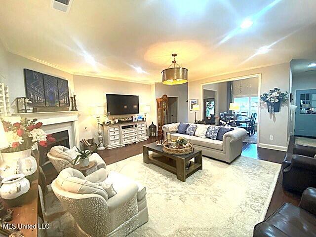771 Robertson Way, Hernando, MS 38632 - living room featuring wood finished floors and a fireplace