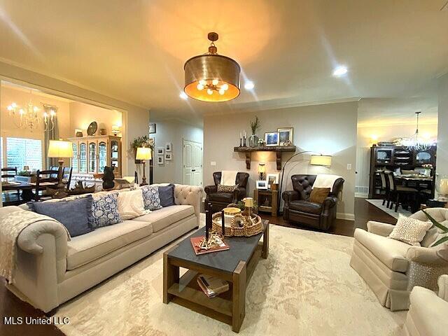 771 Robertson Way, Hernando, MS 38632 - living area featuring a chandelier and recessed lighting