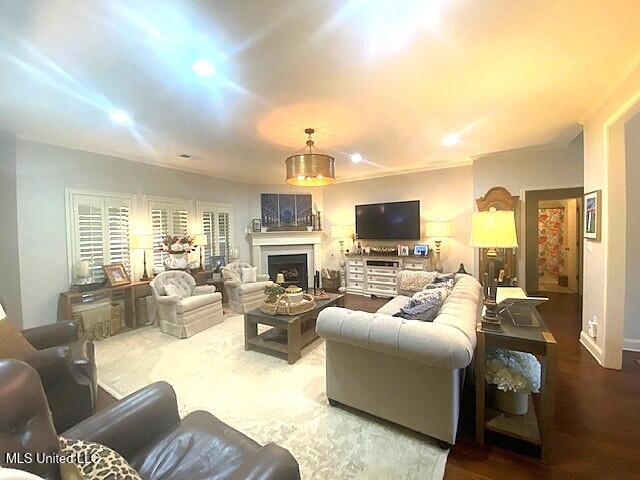 771 Robertson Way, Hernando, MS 38632 - living room with a fireplace and wood finished floors