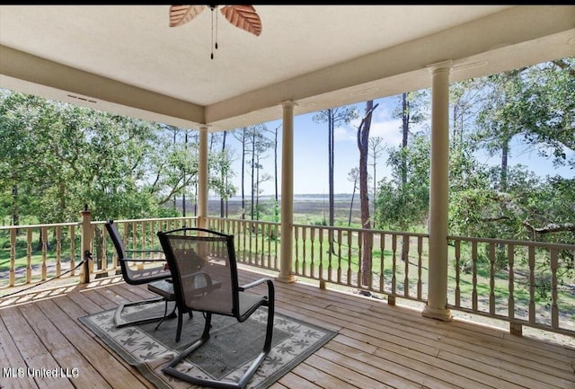 6301 Mary Mahoney Dr, Ocean Springs, MS 39564 - wooden deck with ceiling fan