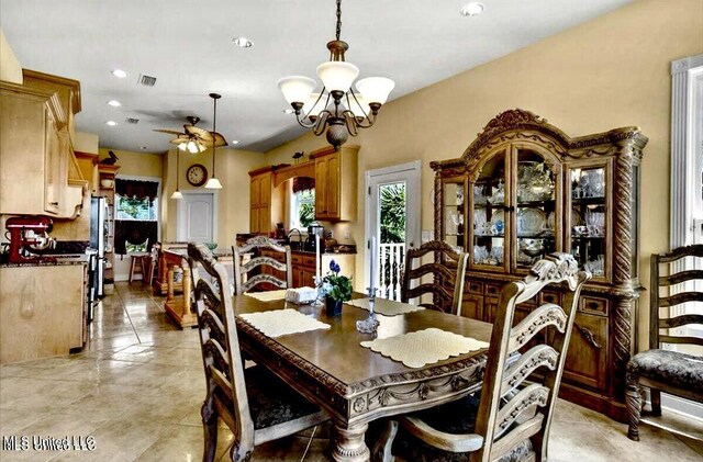 6301 Mary Mahoney Dr, Ocean Springs, MS 39564 - dining room featuring a ceiling fan, a chandelier, recessed lighting, and light tile patterned flooring