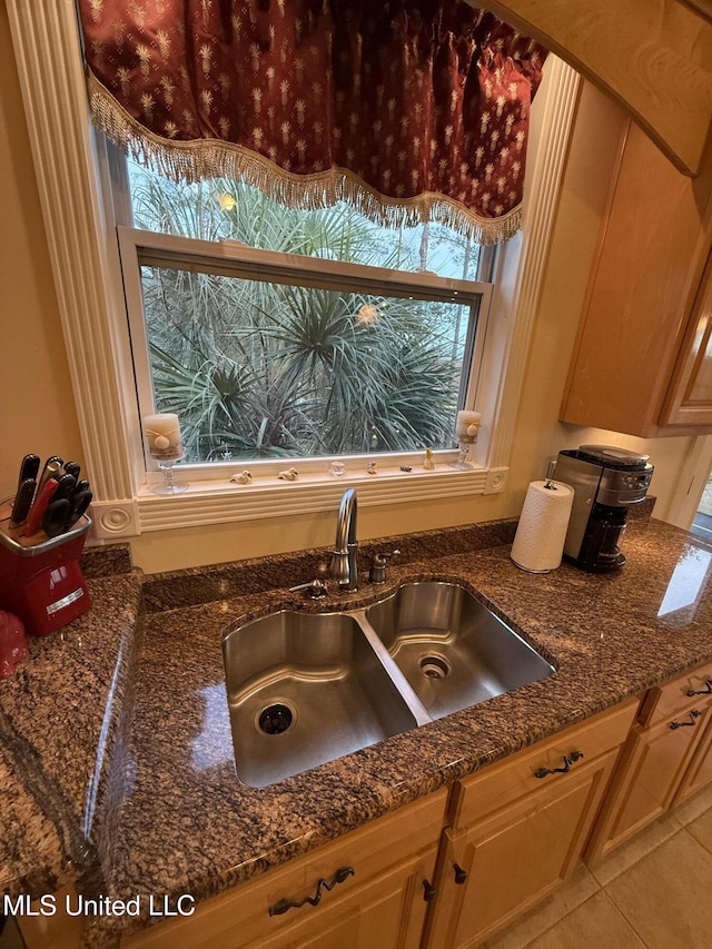 6301 Mary Mahoney Dr, Ocean Springs, MS 39564 - kitchen view of a sink and dark stone counters