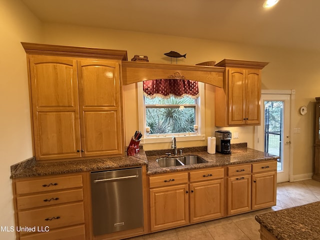6301 Mary Mahoney Dr, Ocean Springs, MS 39564 - kitchen with dishwasher, a sink, dark stone countertops, and baseboards