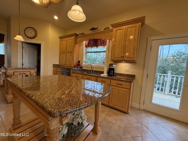 6301 Mary Mahoney Dr, Ocean Springs, MS 39564 - kitchen featuring dishwasher, a kitchen island, a sink, dark stone counters, and recessed lighting
