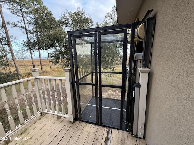 6301 Mary Mahoney Dr, Ocean Springs, MS 39564 - entryway with a textured wall and hardwood / wood-style floors