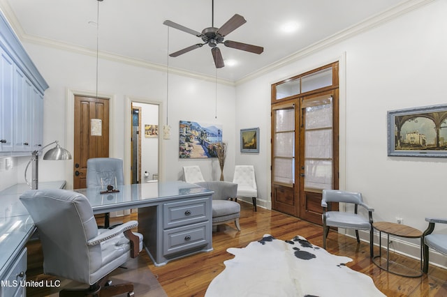 home office with french doors, dark hardwood / wood-style floors, ceiling fan, and crown molding