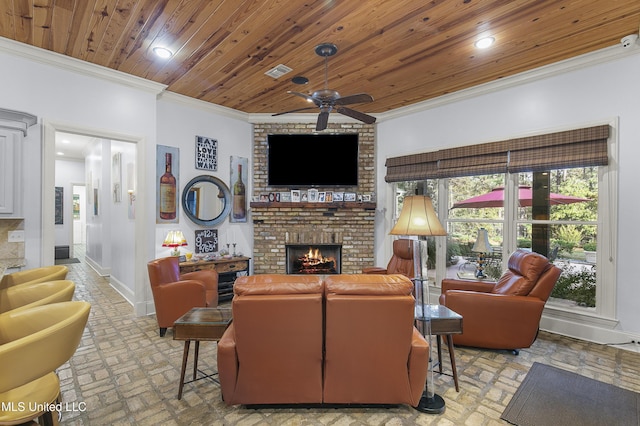 living room with ceiling fan, ornamental molding, a fireplace, and wood ceiling