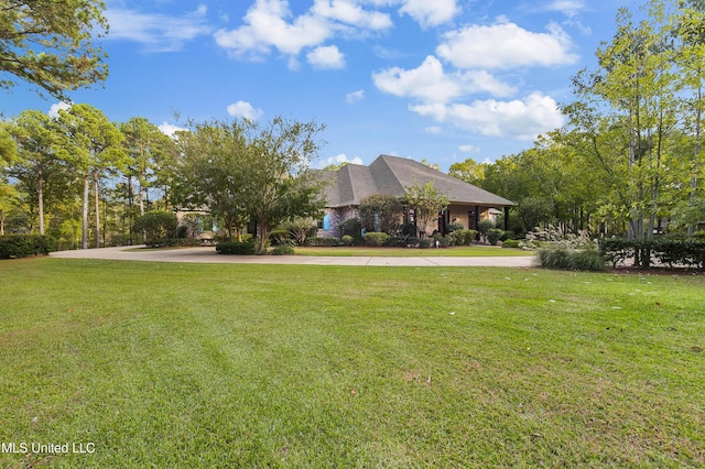 exterior space with a front yard