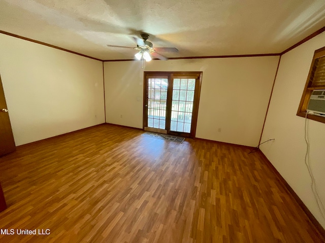 unfurnished room featuring ornamental molding, a textured ceiling, wood-type flooring, and ceiling fan