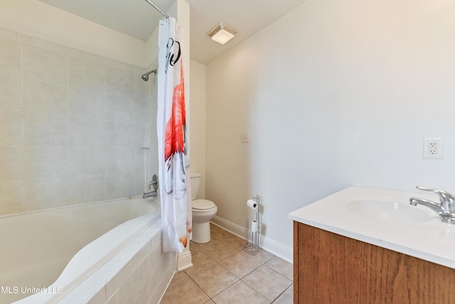 full bathroom featuring tile patterned floors, toilet, vanity, and shower / bath combo