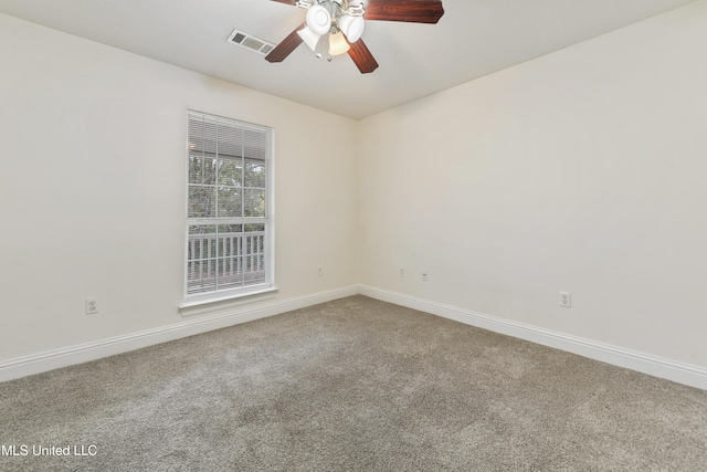 unfurnished room with carpet flooring and ceiling fan