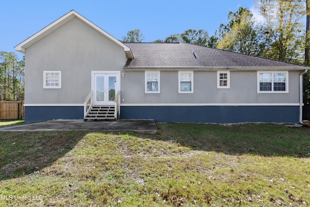 back of house featuring french doors, a yard, and a patio