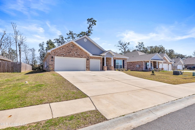 ranch-style home featuring an attached garage, brick siding, fence, driveway, and a front lawn