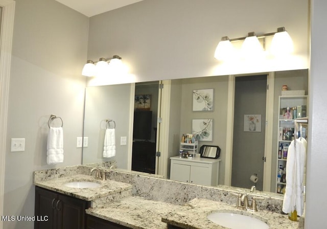 8146 Wisteria Dr, Olive Branch, MS 38654 - bathroom featuring double vanity