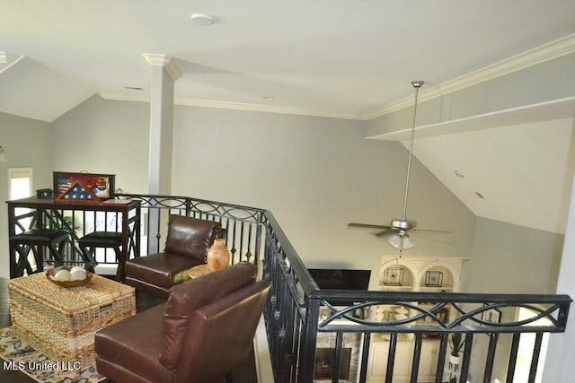 8146 Wisteria Dr, Olive Branch, MS 38654 - living area featuring vaulted ceiling, a ceiling fan, and crown molding