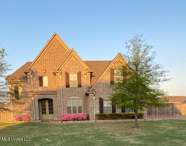 8146 Wisteria Dr, Olive Branch, MS 38654 - view of front facade featuring brick siding