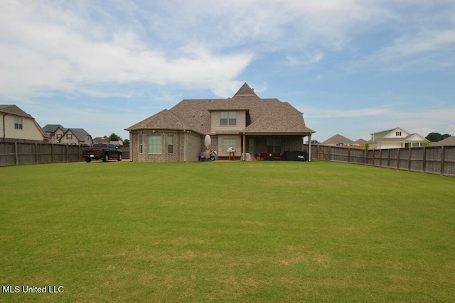 8146 Wisteria Dr, Olive Branch, MS 38654 - rear view of house with a fenced backyard