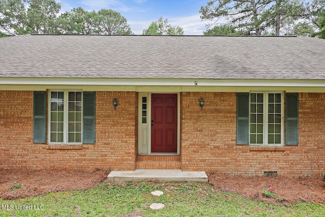 entrance to property with a porch