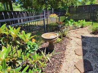 3808 Acadian Village Dr, Ocean Springs, MS 39564 - view of yard featuring fence