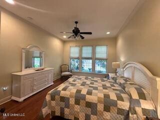 3808 Acadian Village Dr, Ocean Springs, MS 39564 - bedroom with dark wood-style flooring, baseboards, recessed lighting, and crown molding
