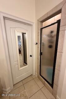 3808 Acadian Village Dr, Ocean Springs, MS 39564 - bathroom featuring a shower stall and tile patterned floors