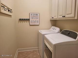 3808 Acadian Village Dr, Ocean Springs, MS 39564 - washroom with independent washer and dryer, baseboards, cabinet space, and tile patterned flooring