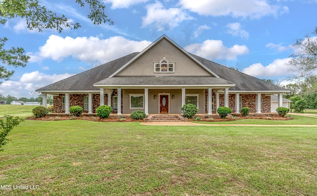 view of front of home featuring a porch and a front lawn