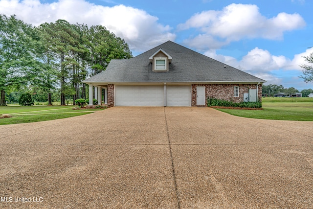 view of property exterior with a lawn and a garage