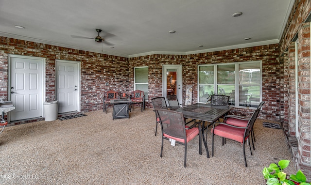 view of patio / terrace featuring ceiling fan