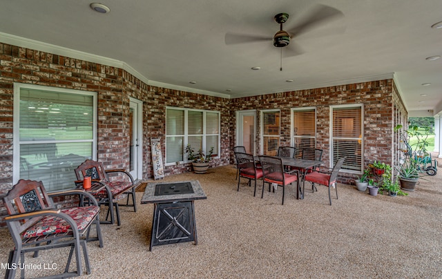 view of patio / terrace featuring ceiling fan