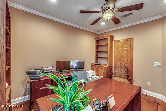 office featuring ceiling fan, ornamental molding, and dark hardwood / wood-style floors