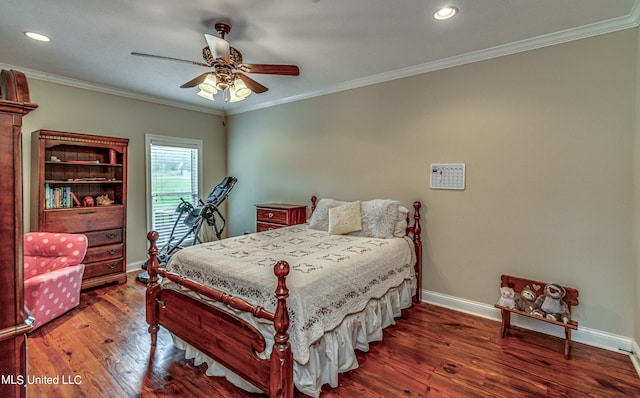 bedroom with crown molding, dark hardwood / wood-style floors, and ceiling fan