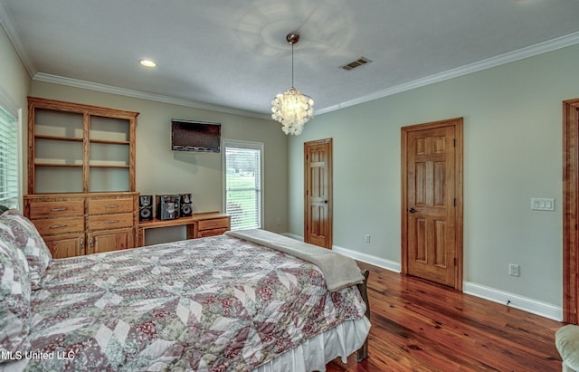 bedroom featuring ornamental molding, a notable chandelier, and dark hardwood / wood-style floors